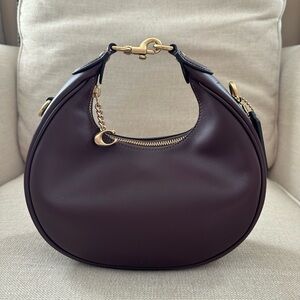 COACH Jonie 22 in Gloventanned Leather (Color: Black Currant)